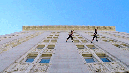 asylum-art:  Waltz On The Walls Of City Hall Bandaloop dancers Amelia Rudolph and Roel Seeber take vertical choreography to new heights on Oaklandâ€™s City Hall during the Art   Soul Festival. Wacth the video:  http://www.bandaloop.org Instagram: @bandalo