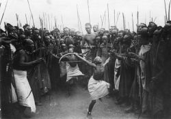 atomickong:  Young Tutsi boys dance and reenact “bow-and-arrow