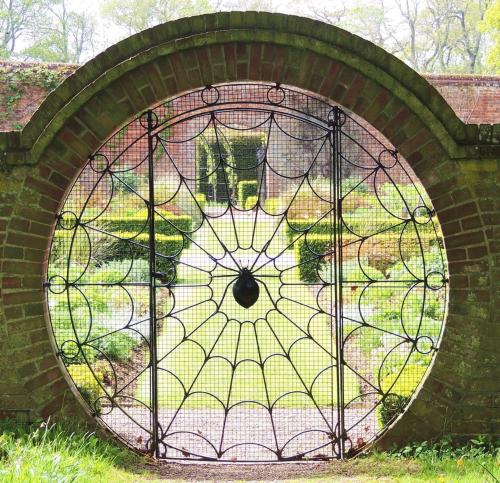 sixpenceee:   This cool gate in Norfolk.               
