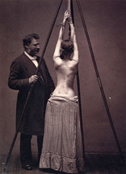 Lewis Sayre with his suspension device for the treatment of scoliosis,