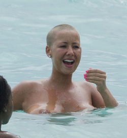 toplessbeachcelebs:  Amber Rose (Model) swimming topless in