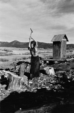 Irwin Klein - Woman chopping wood, 1970s.