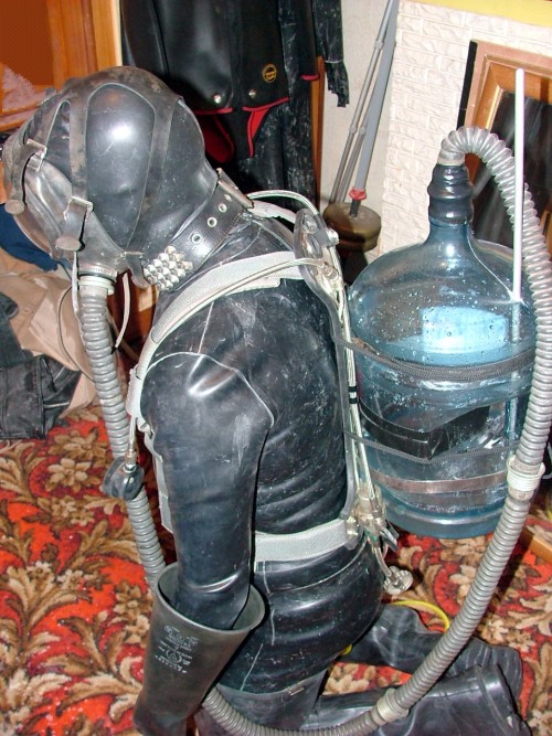 rubberworkie: rubberdom2000:  Wherever slaveRubbergimp goes, it can’t escape the bubble bottle!  Fuck hell yeh 