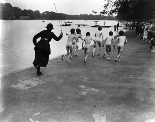 A gang of skinny dippers is chased down the street at Hyde Park