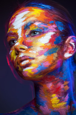 Painted faces by Valeriya Kutsan (here and here)