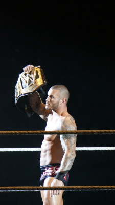 Holding the title up proudly…while everyone stares at