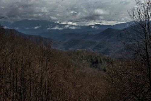 npr:  Robbinsville High School sits in a small gap in the Smoky Mountains of North Carolina. Green slopes dotted with cattle hug in around the school before they rise into a thick cover of pine trees. David Matheson is the principal here. And he’s the