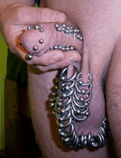 bootedskn:  Hot fucking Metal  be fun to wear all that jewlery