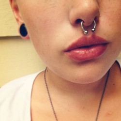 ccc0urtney:  Got a new septum ring, but had to  stretch it to