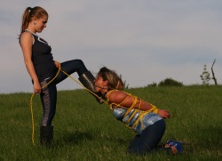 Outdoor bondage victory pose