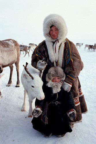 onlyreindeers:  A Tundra Nenets woman poses with her daughter