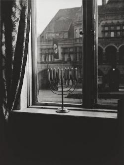 historyinpics42:A Jewish menorah defies the Nazi swastika - 1931