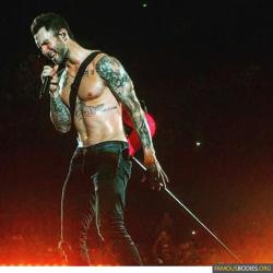 famousbodiesorg:  Adam Levine Performs Shirtless at Concert in