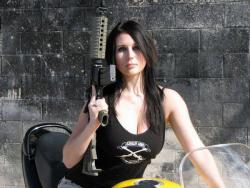 chicksandchoppers:  Hot chick a gun and a bike what more can