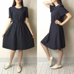 someplacesunnier:  This lovely navy blue polka dot number is