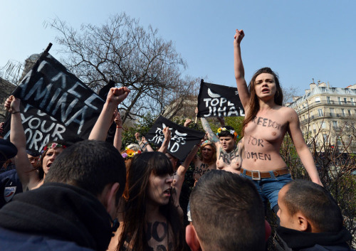 ncpunx:   stonerswithboners:  adventuresinhires:  Members of Ukrainian feminist group Femen staged protests across Europe as they called for a â€œtopless jihad.â€ The demonstrations were in support of a young Tunisian activist named Amina Tyler. Last