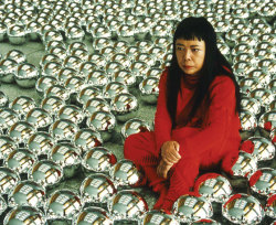 gallowhill:  Yayoi Kusama sitting in Narcissus Garden in 1999