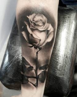 tattoosnob:  Rose tattoo by @lukeslayer1 in Kendal, England #lukeslayer1