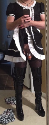 jownsd:Caged, dressed in my maid uniform and thigh high boots