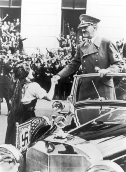 fuehrerbefehl:  Hitler greeting a beautiful German woman as he