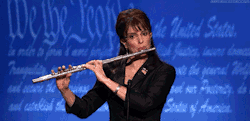 ffey:  GOD BLESS I FOUND THIS GIF OF TINA PLAYING THE FLUTE AND
