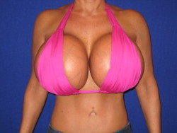 too-much-is-not-enough:  Her impossible breasts ache. Her skin