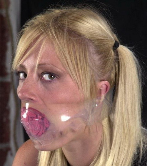 From old Insex… panties stuffed in her mouth and lots of clear tape.