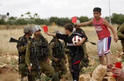 ahmadkhader:    RED CARD, get out of my country.Viva Palestina
