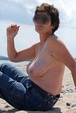 Beach granny in jeans with nice breasts!Find Your Sexy Beach