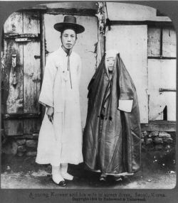 historicaltimes:  A young Korean husband and wife in street dress,