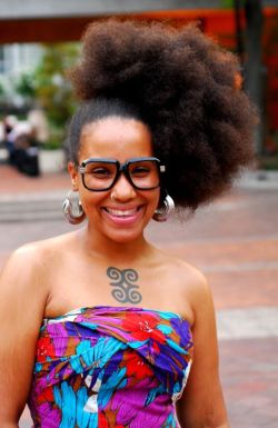 naturalhairqueens:  That hair puff! and she’s tatted too? NICE!