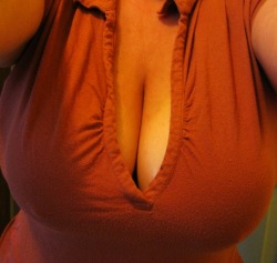 smushedbreasts:  Damn! Huge breasts smushed in a tight red top!