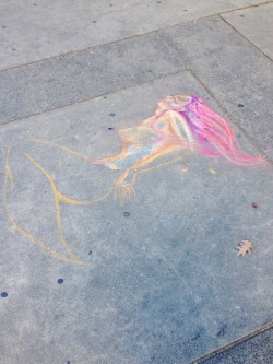 bruisybaby:chalk mermaids outside of where I work A new one appears
