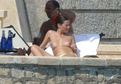toplessbeachcelebs:  Anna Friel (Actress) sunbathing topless