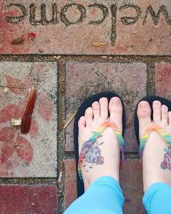 Found two cardinal feathers  (?)  on our welcome mat as we were