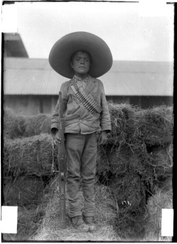 bugwork:  Young Mexican boy soldier on guard during the Mexican