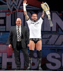 fishbulbsuplex:  WWE Champion C.M. Punk with Paul Heyman