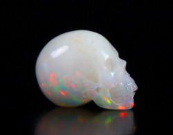 mineralists:  Opal Carved Crystal Skull by Skullis. Very cool!!