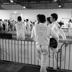 modernfencing:  [ID: several epee fencers standing around at