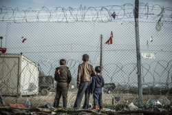 troposphera:  Idomeni, Greece Three boys in the Idomeni refugee