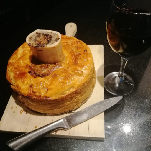 tastymeatsandtreats:Pork pie baked with a marrow bone with home