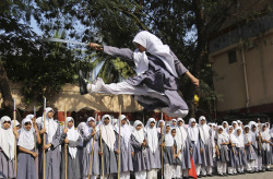 images4images:  An Indian Muslim girl performs martial arts during