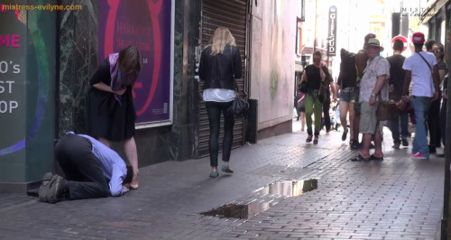 femalesruletheworld:  Displaying female domination in public!  By Mistress Evilyne If you know anything about Me, you will be aware that one of My absolute favourite pastimes is humiliating men in public. We started off gently, with things such as foot