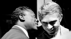 wehadfacesthen:  Miles Davis talks to Steve McQueen at the Monterrey