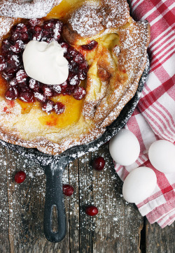 fullcravings:  Dutch Baby with Caramelized Cranberries and Clementine