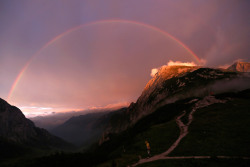 nikolawashere:  A rainbow spans over a valley between the Hohes