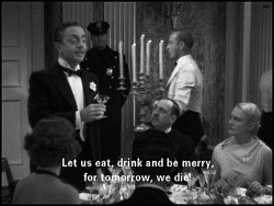  William Powell proposes a cheery toast - “The Thin Man”