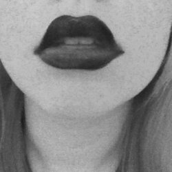 ifeelitslippinaway:  I think black lipstick makes my lips look