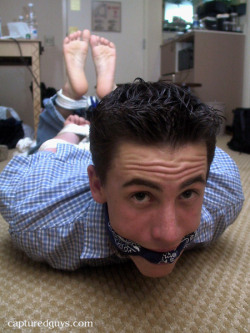 barefootguysroped:  nothing beats the pic of a barefoot guy hogtied