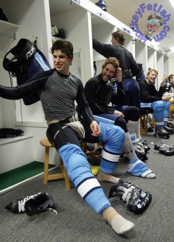 Men in Hockey Gear